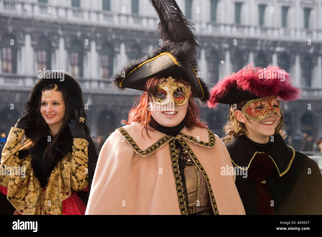 Young women revellers in costume and masks at the Venice carnival in St ...
