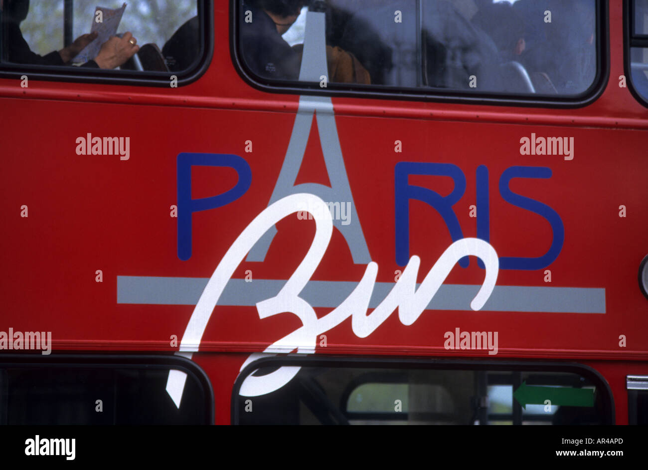 Red  Paris bus with blue and white logo including Eiffel tower Stock Photo