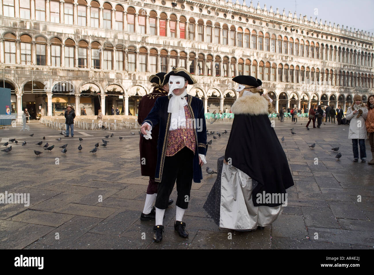 Revellers in masks and costume at the Venice carnival in St Mark's ...