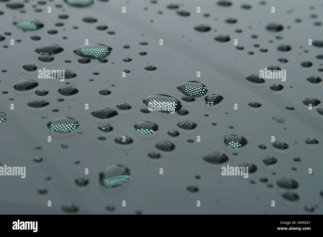 Drops of water over bonnet of a car London Oct 2004 Stock Photo