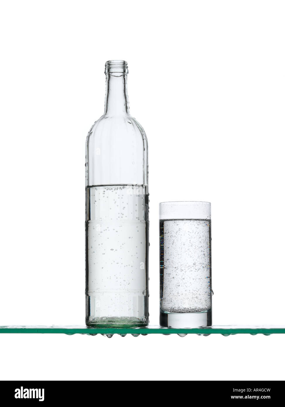 Sparkling water in a bottle and a glass Stock Photo Alamy