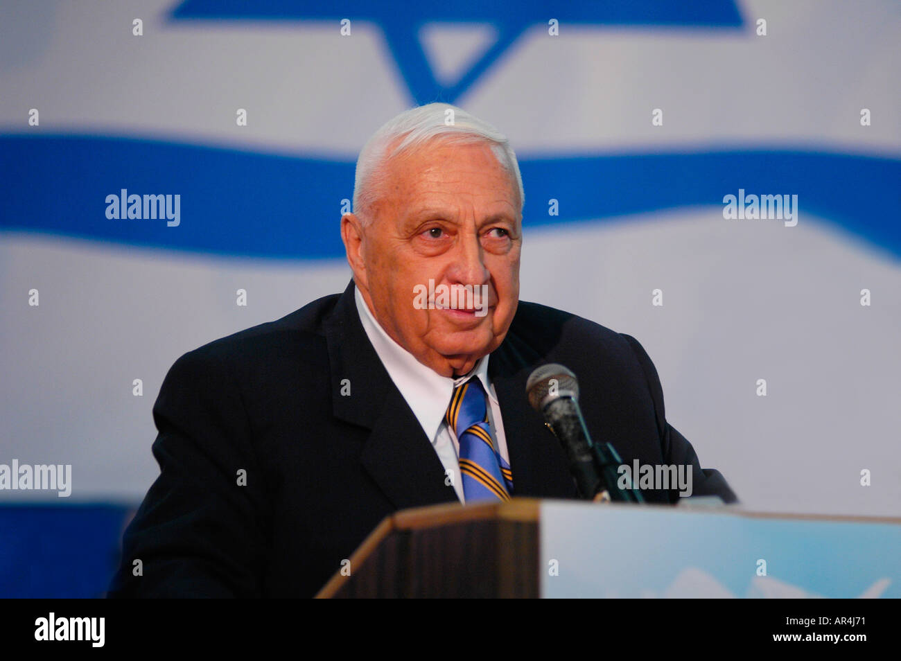 Israeli Prime Minister Ariel Sharon surrounded by bodyguards as he speaks to members of Likud Party central convention. Tel Aviv Israel Stock Photo
