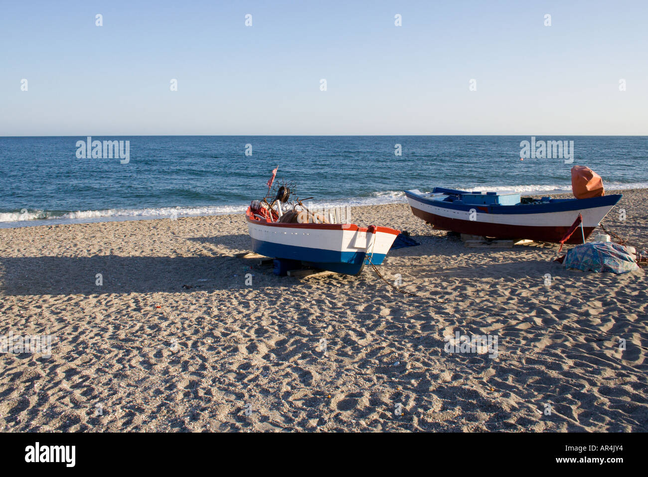 Small fishing boats rest hi-res stock photography and images - Alamy