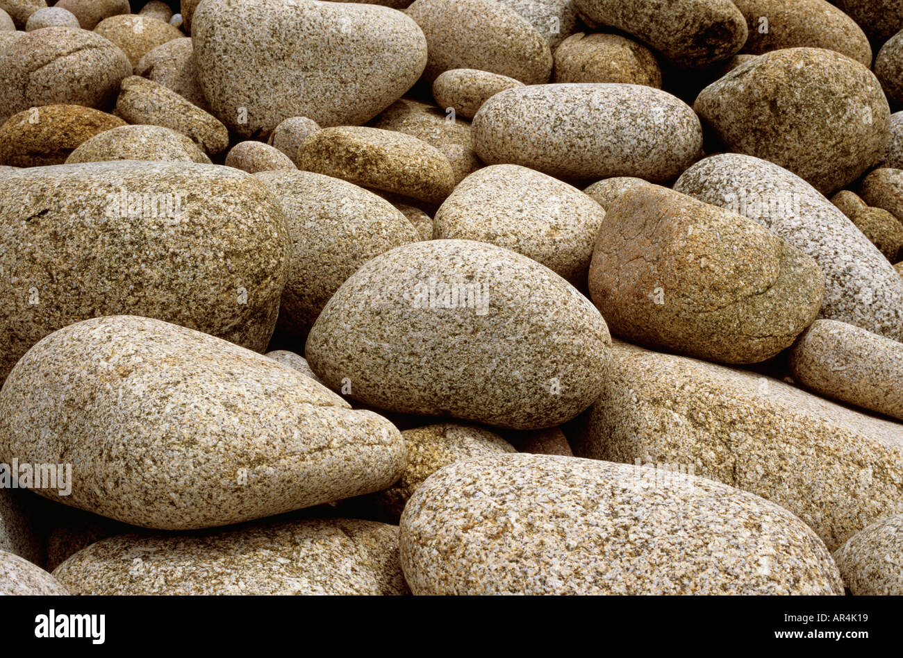 Granite boulders on beach on the Isles of Scilly in Cornwall,UK Stock Photo