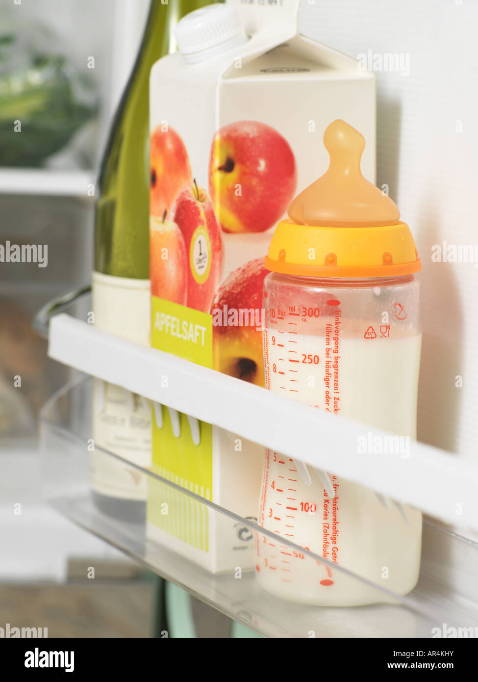 Baby bottle in refrigerator Stock Photo Alamy