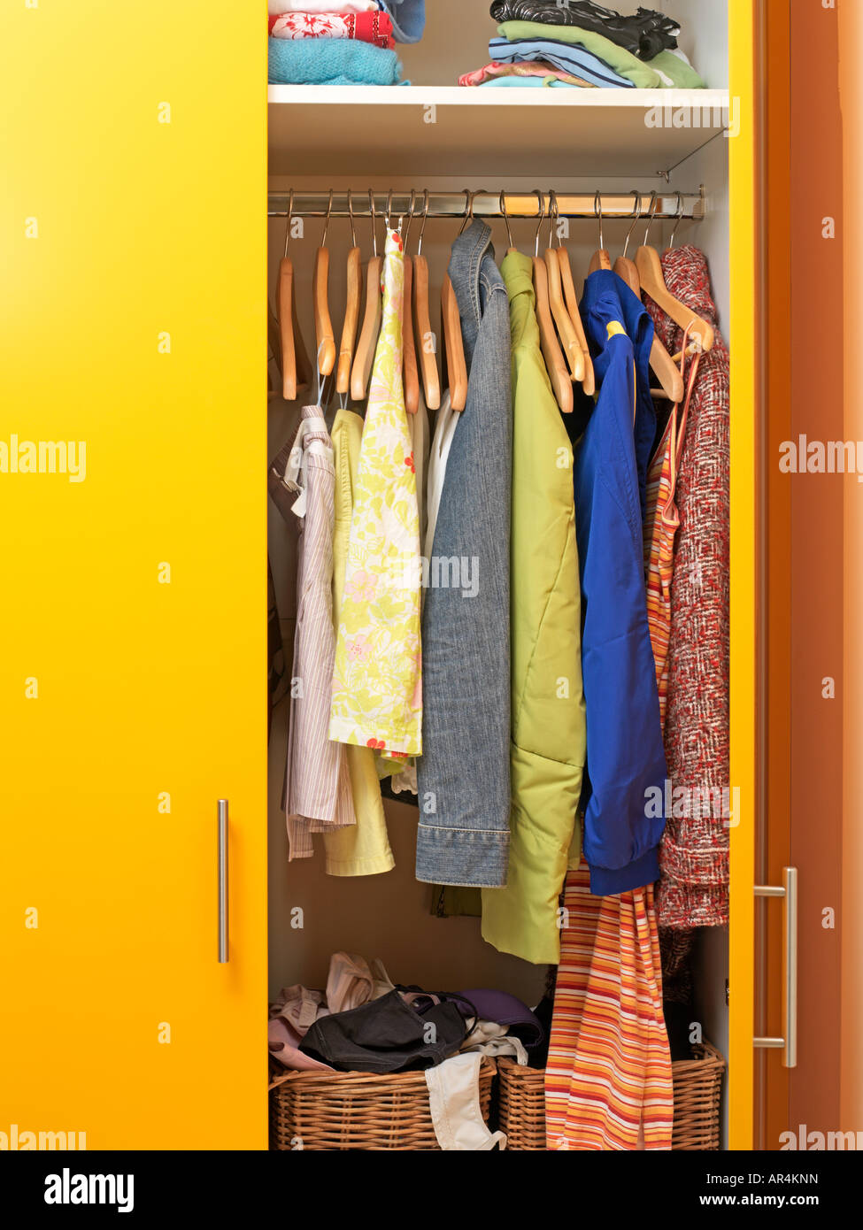 Clothes in a closet Stock Photo Alamy