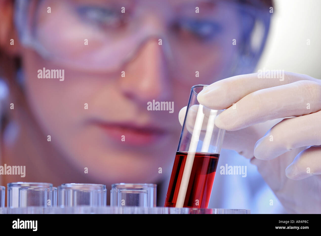 Scientist holding a test tube Stock Photo