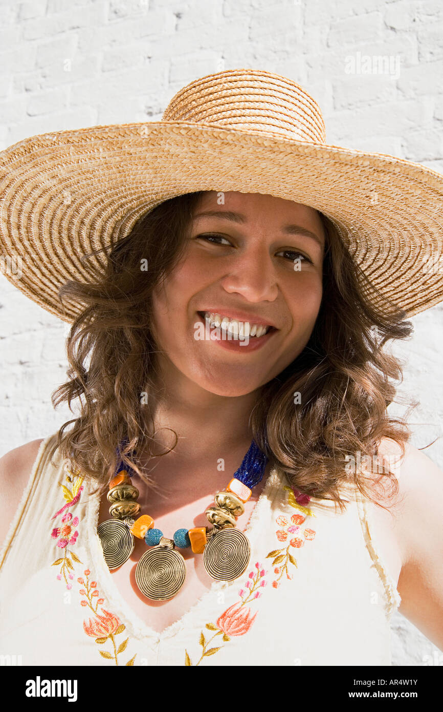 Woman wearing a straw hat Stock Photo Alamy