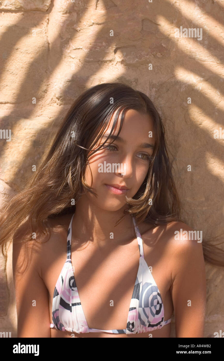 Portrait of Teenage Girl (13-14years) Wearing Bikini in Dappled Shade Stock  Photo - Alamy