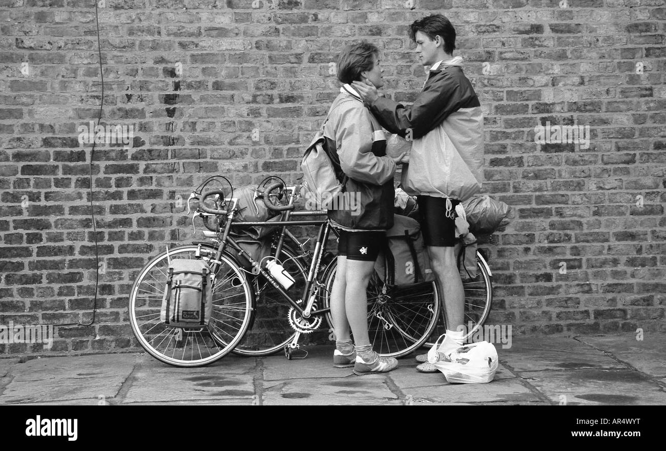 Young couple on cycling holiday having a break in each others company. Stock Photo