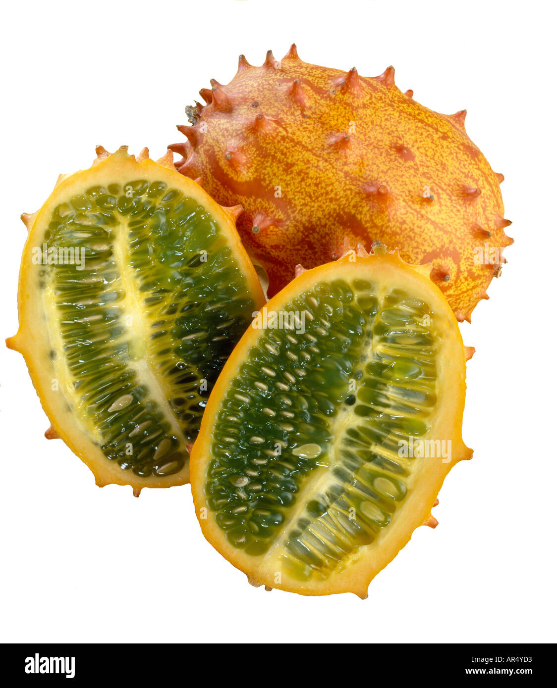 Kiwanos horned melon one whole and two halves Stock Photo Alamy