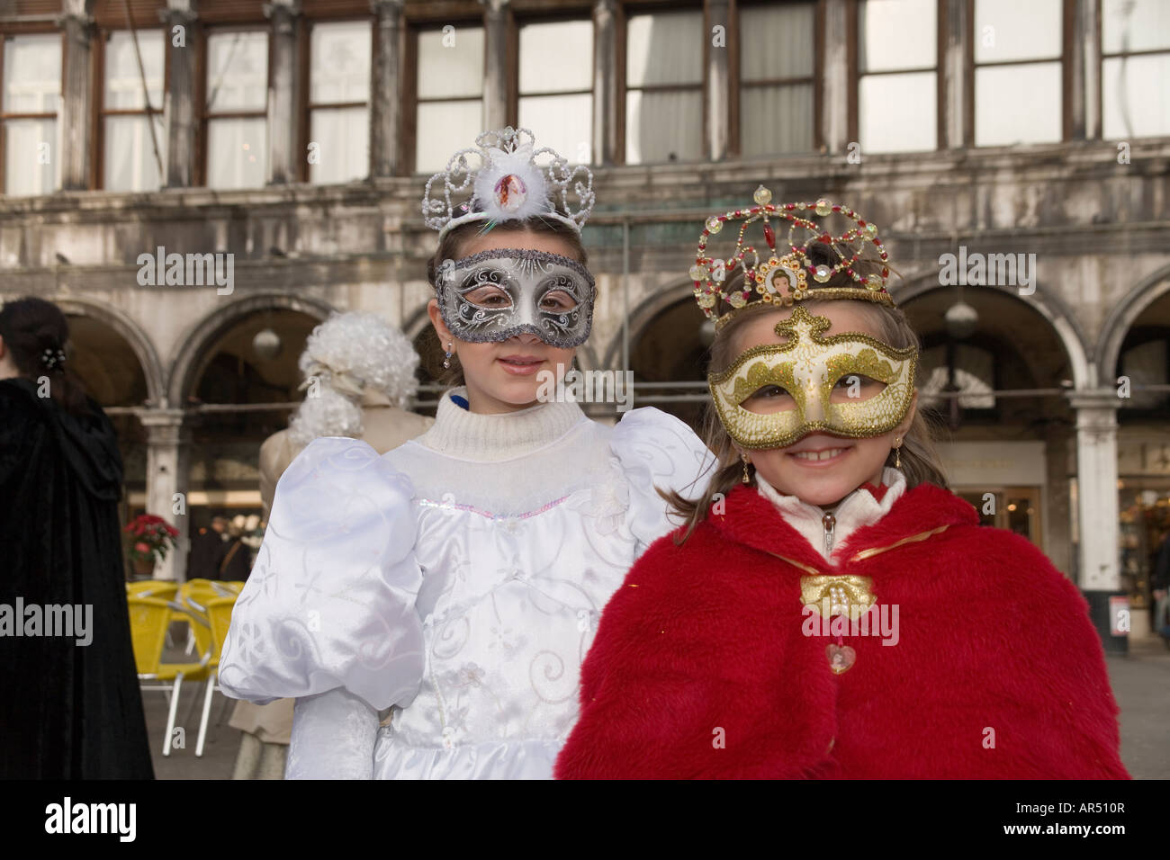 Young girls in costume and masks at the Venice carnival in St Mark's ...