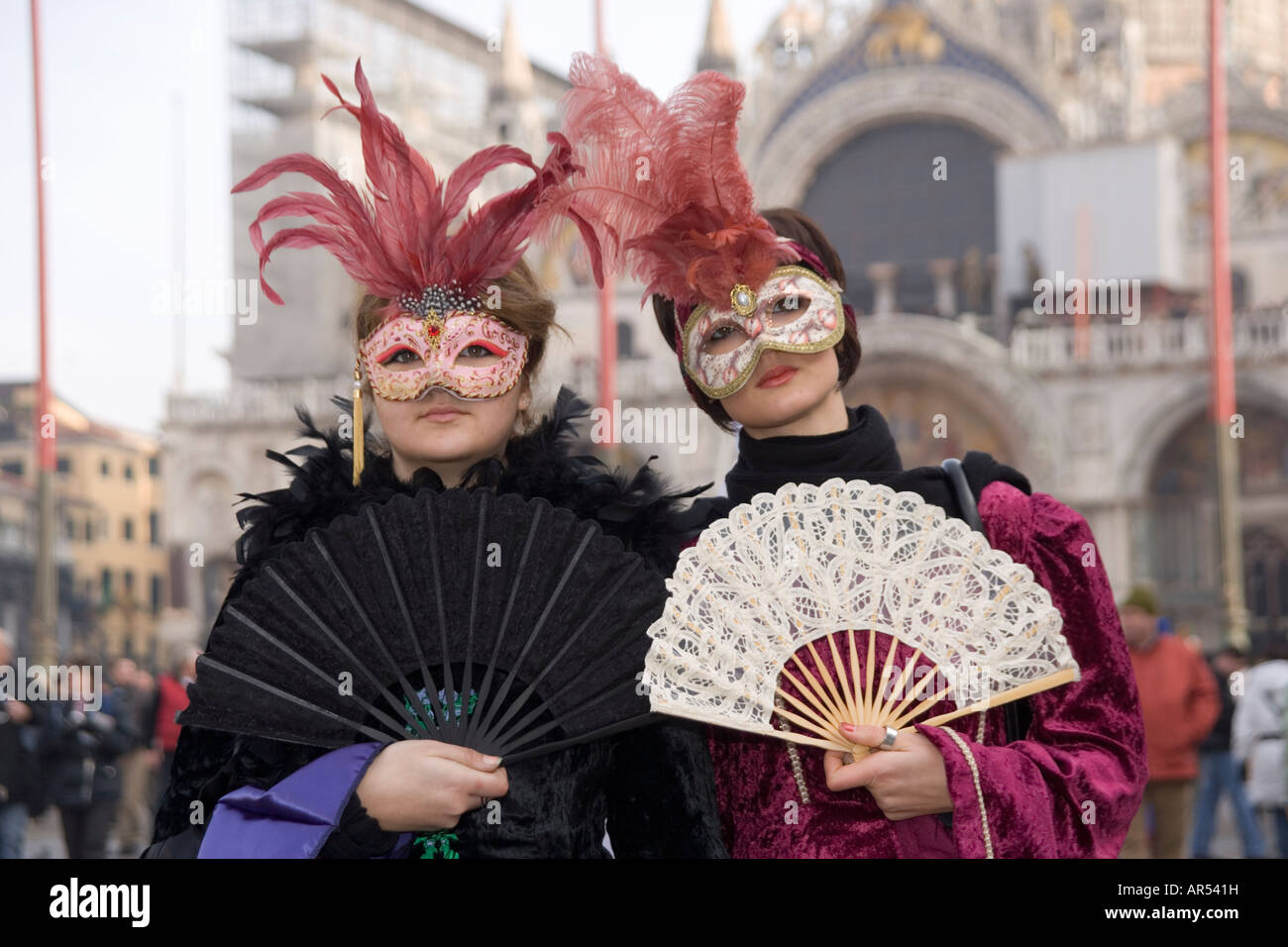 Female revellers in mask and costumes at the Venice carnival in St Mark ...