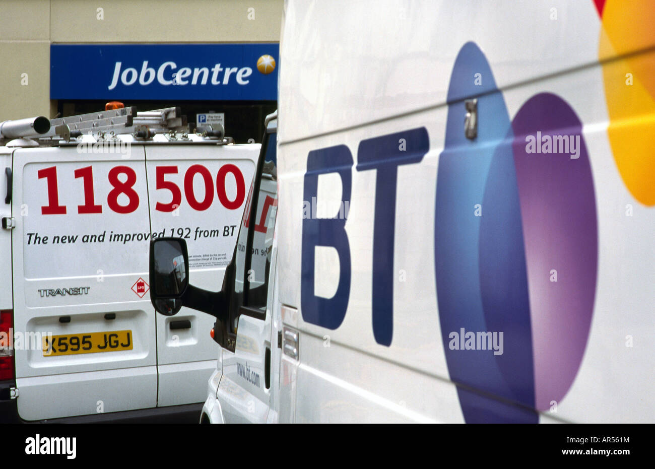 British Telecom utility vans outside a job centre in London's Covent Garden. Stock Photo