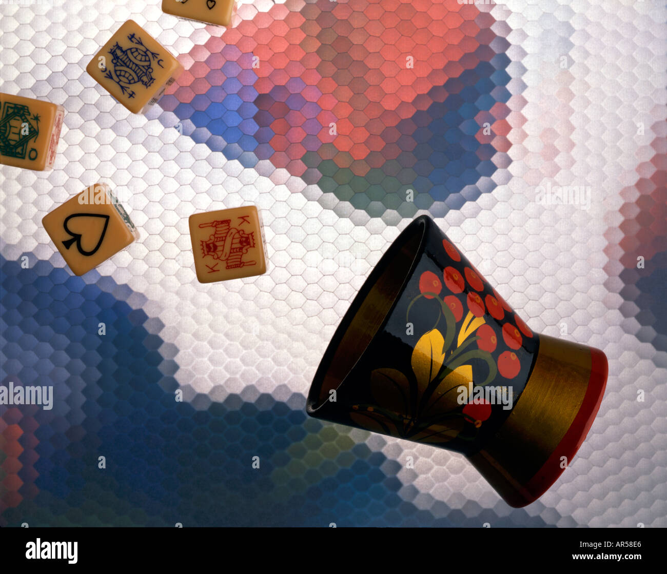 Poker dice and cup throw Stock Photo Alamy