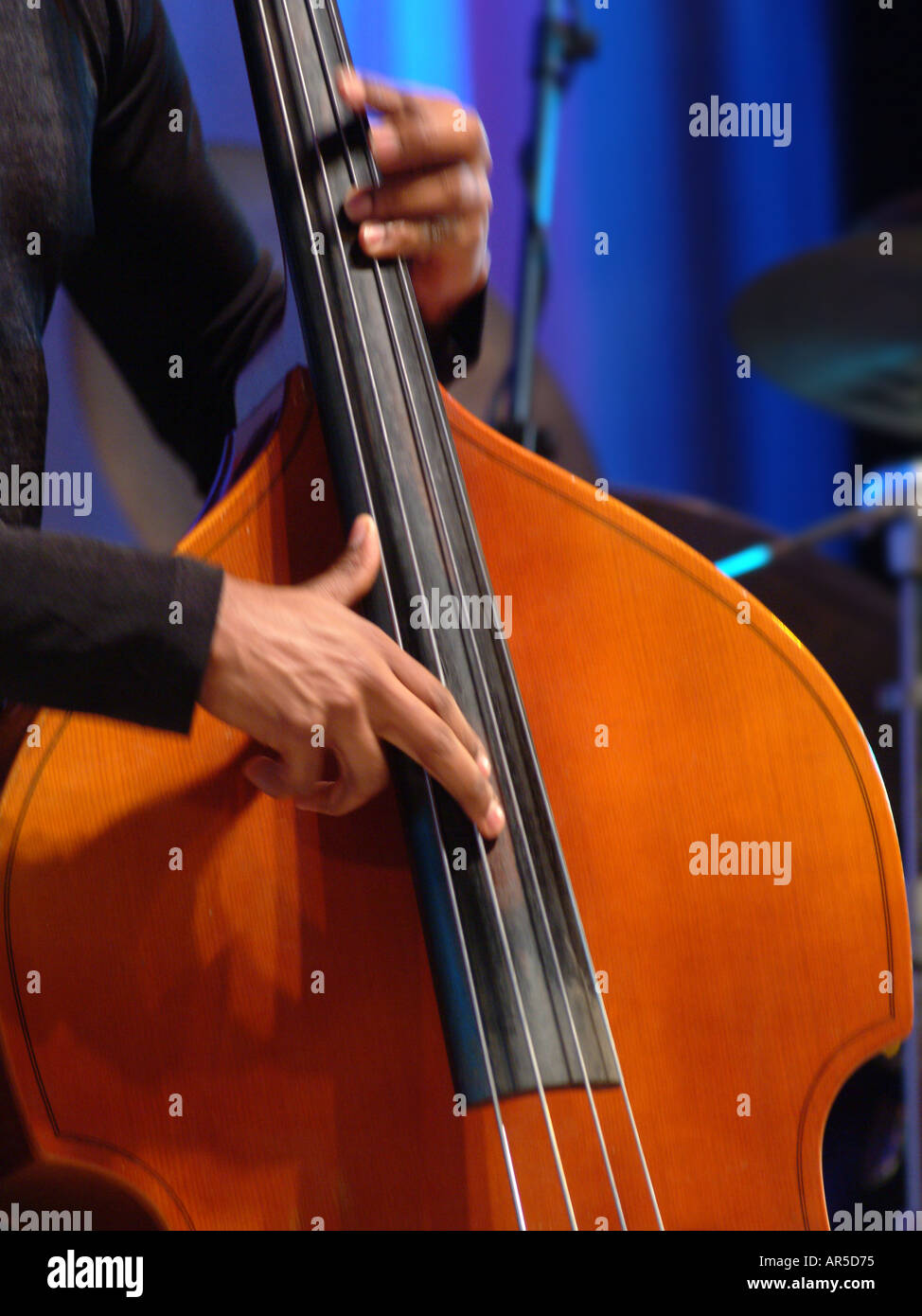 Close-up of musician playing pizzicato on Double Bass Stock Photo