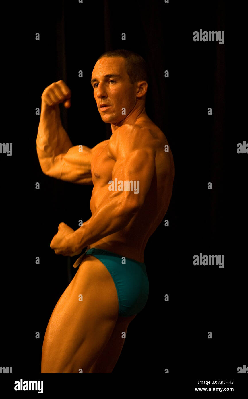 Bodybuilders performing a most muscular pose at a bodybuilding competition in Haifa Israel Stock Photo