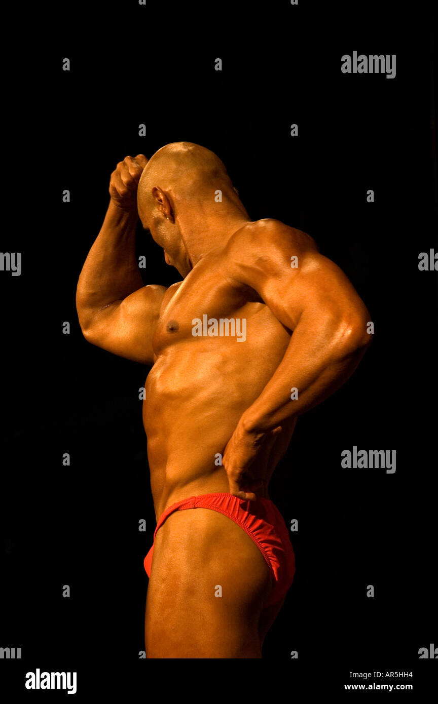 Bodybuilders performing a most muscular pose at a bodybuilding competition in Haifa Israel Stock Photo