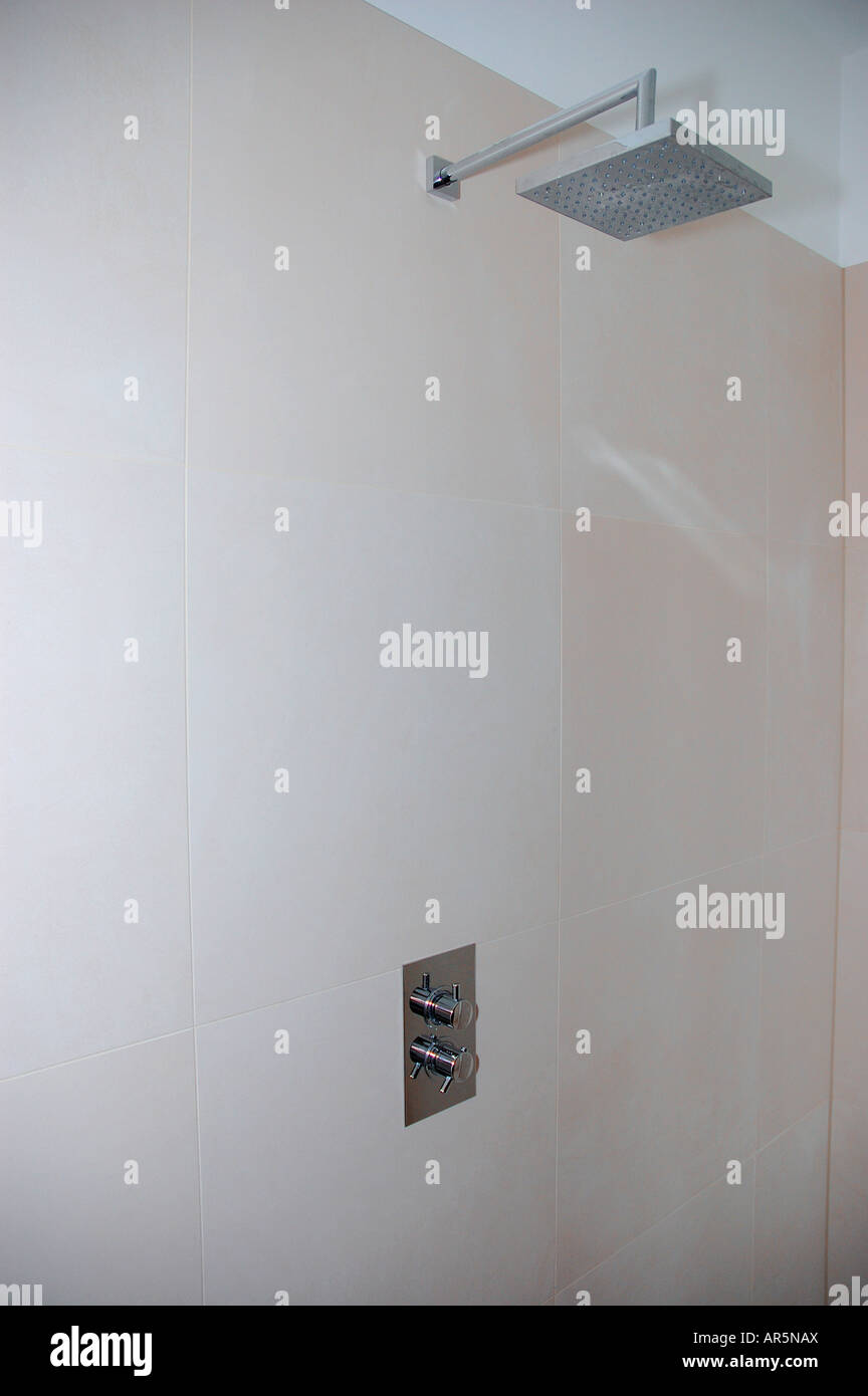 Square Chrome Shower Head In Modern White Shower Room Stock