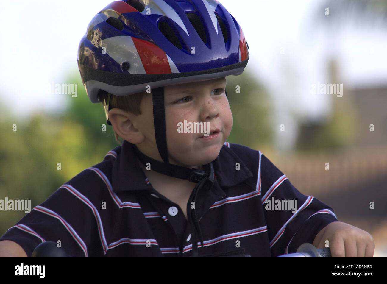 young boy with bike helmet Stock Photo