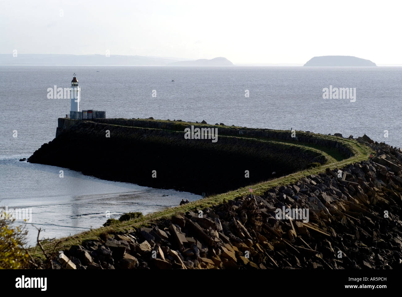 breakwater and light house with steepholm island in the distance barry vale of glamorgan Stock Photo