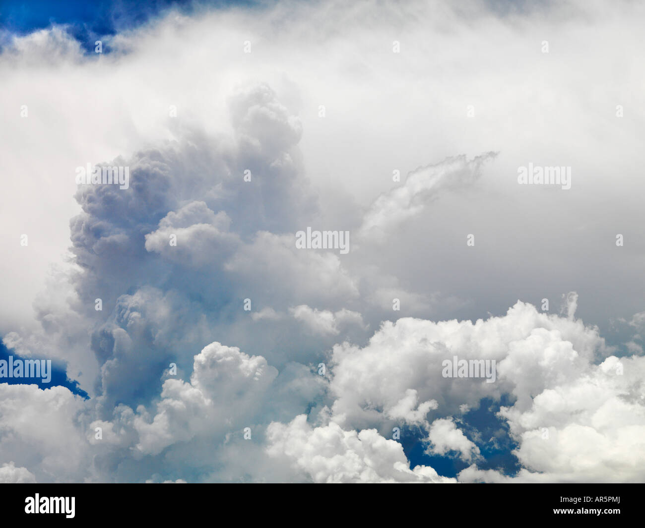 Large fluffy clouds in sky Stock Photo