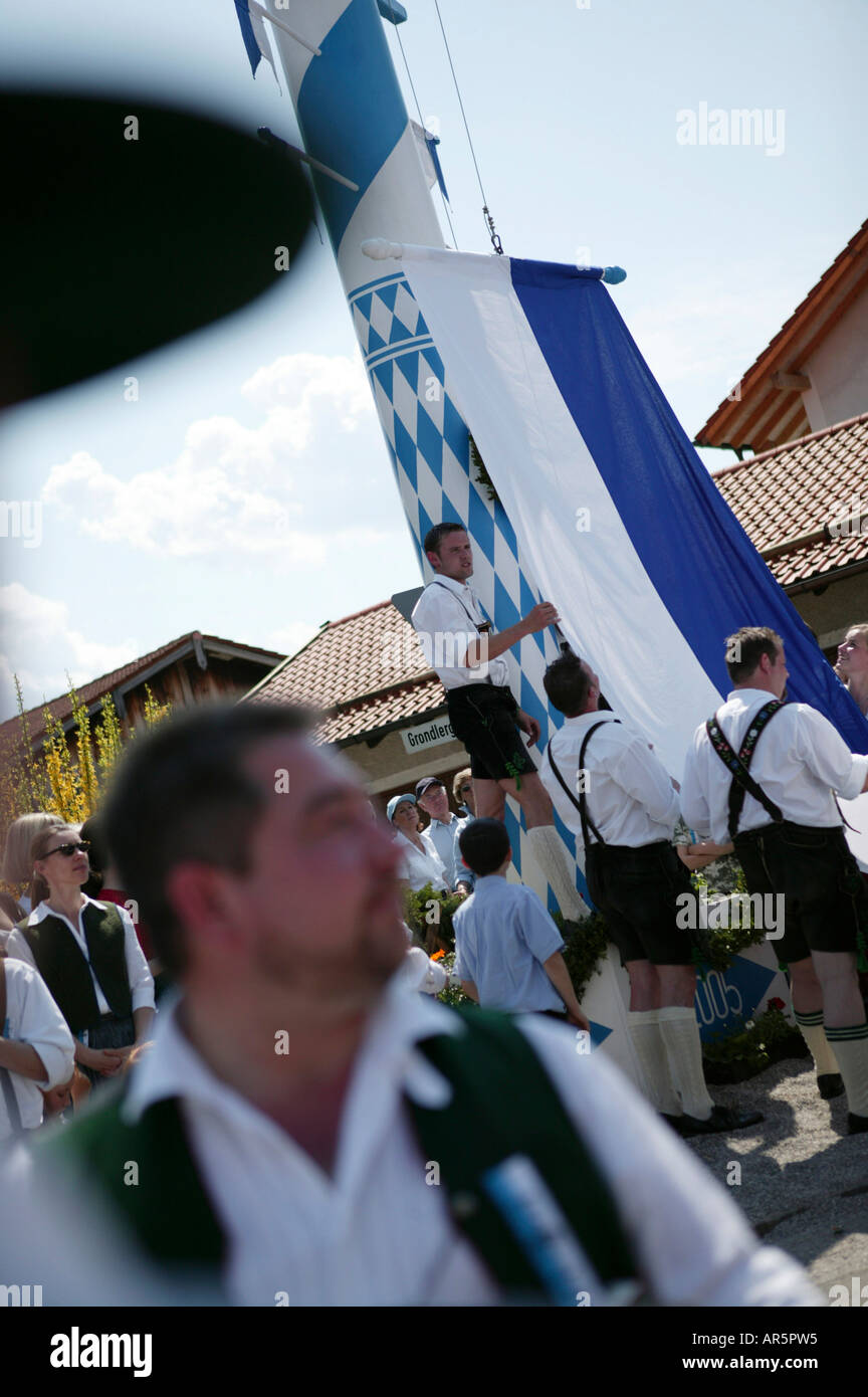 Boys in traditional bavarian clothes at the celebration of 1st May, Muensing, Bavaria, Germany Stock Photo