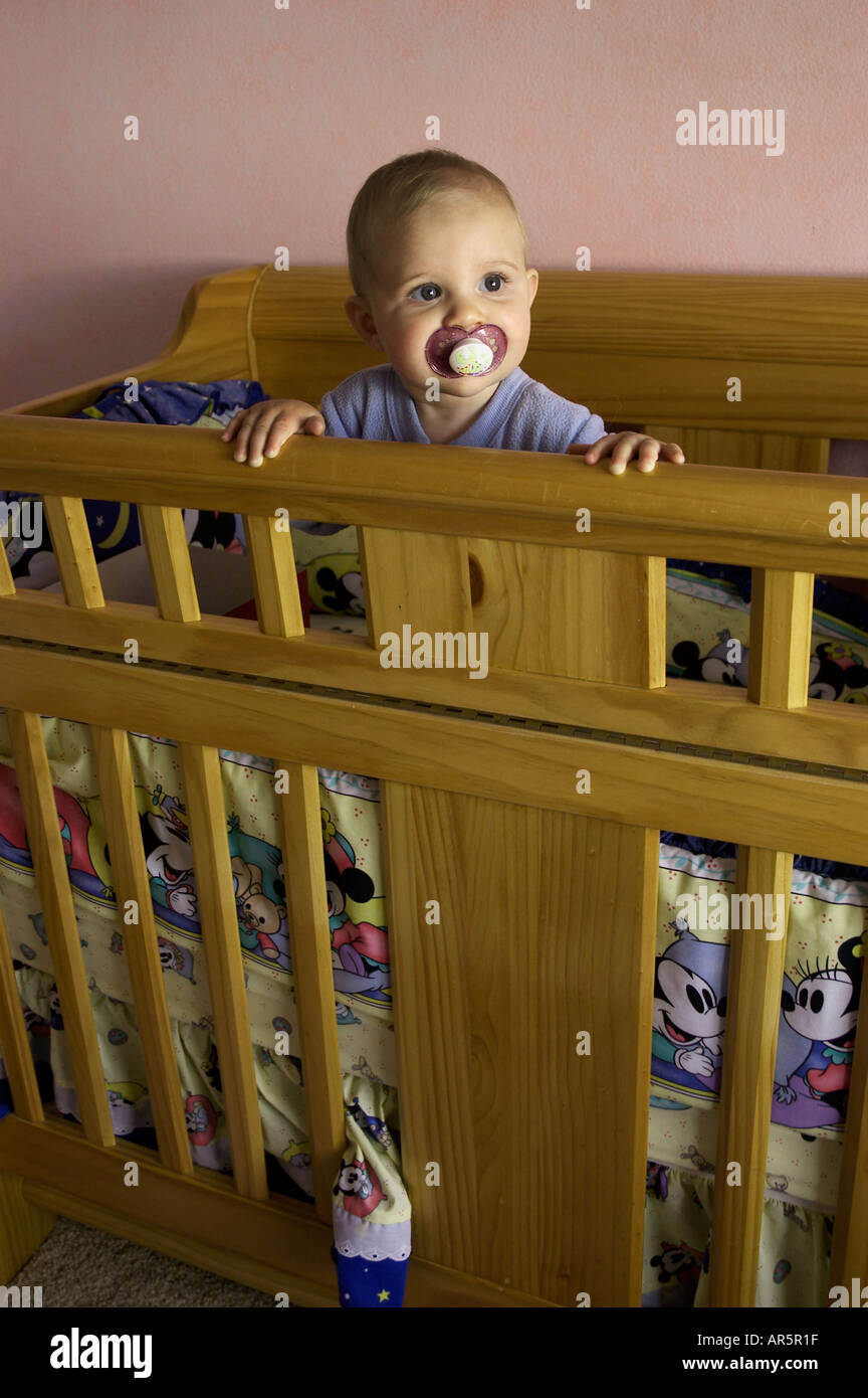 baby in crib Stock Photo