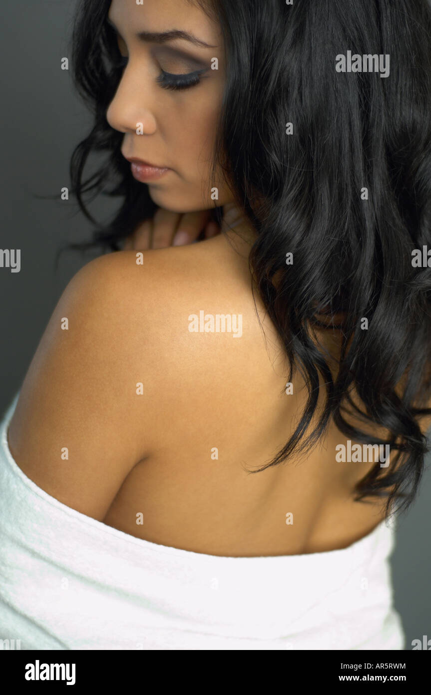 Hispanic woman with bare shoulders Stock Photo