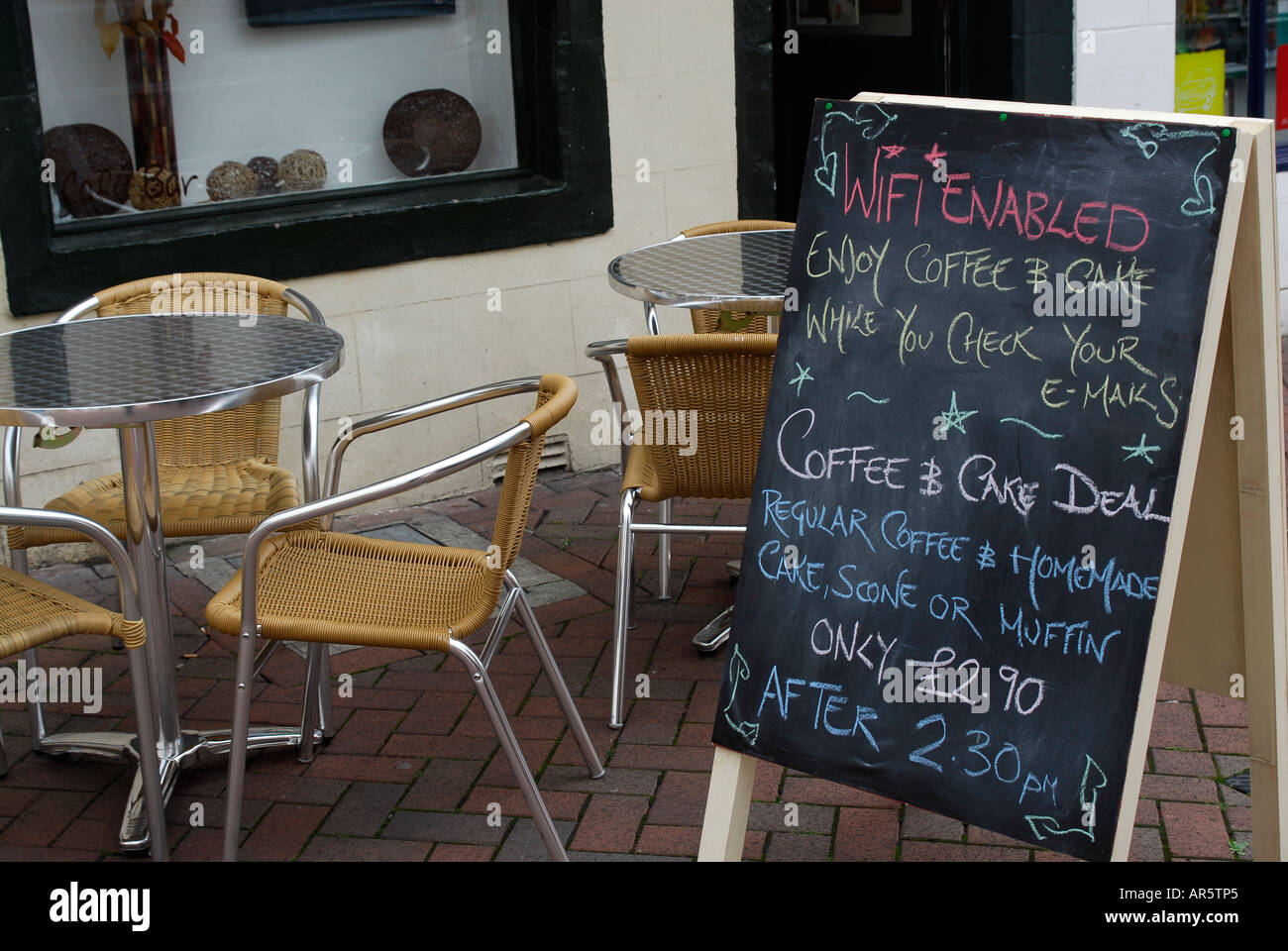 WiFi enabled cafe. Wireless network, internet hotspot Stock Photo