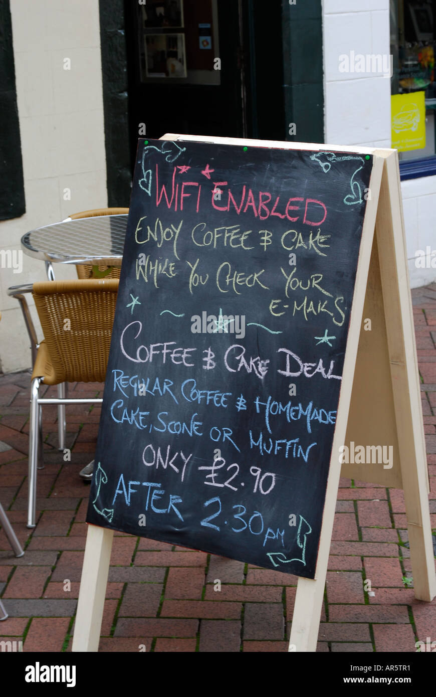 WiFi enabled cafe. Wireless network, internet hotspot Stock Photo
