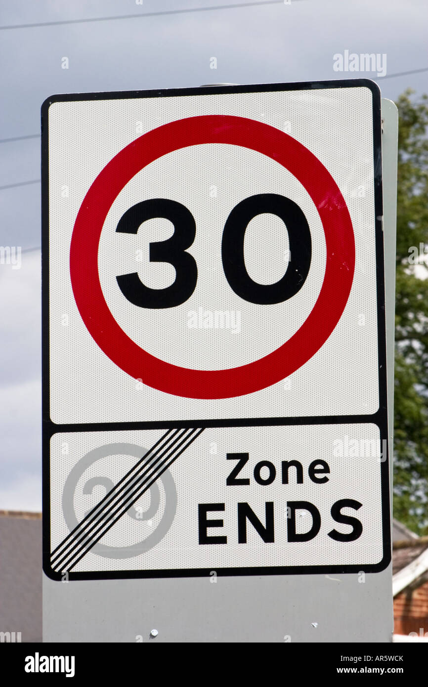 30mph speed limit as 20mph zone ends road sign Stock Photo
