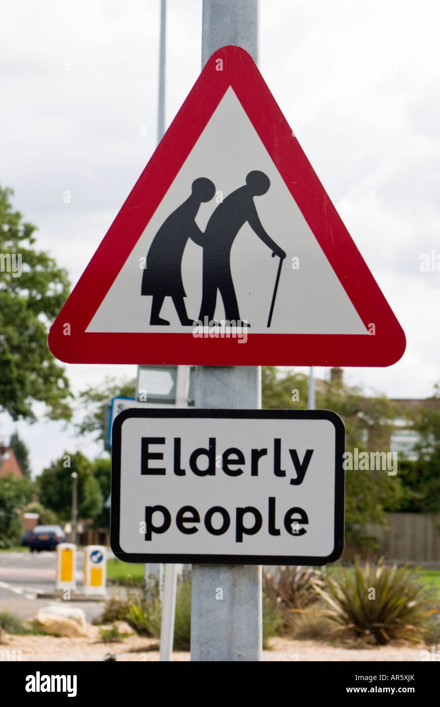 Caution elderly people road sign Stock Photo Alamy