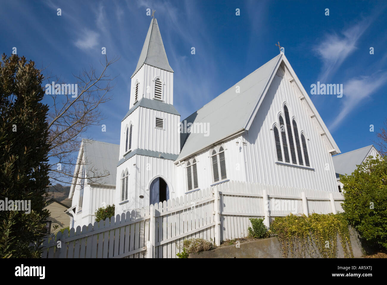 Akaroa 'Banks Peninsula' South Island New Zealand May Anglican Church of St Peter white wooden clapboard building 1864 Stock Photo