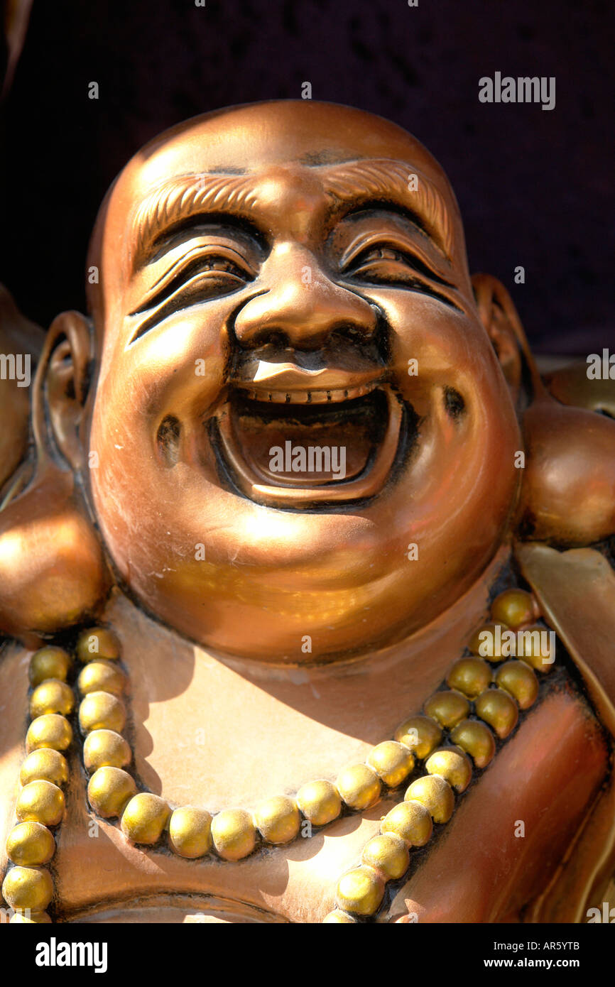 Golden happy buddha statue Stock Photo