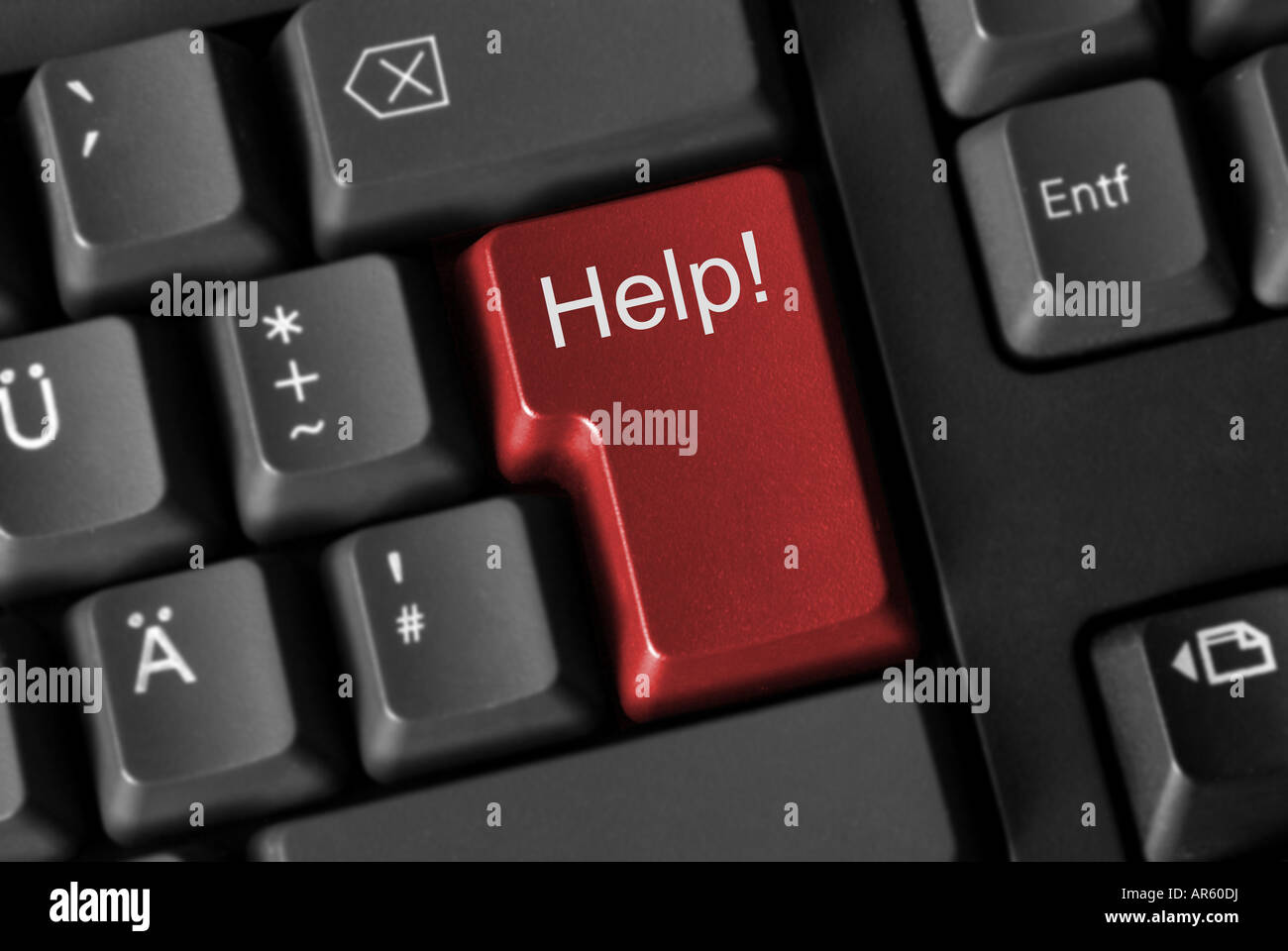 Close up of a computer keyboard with a red key showing help Stock Photo ...