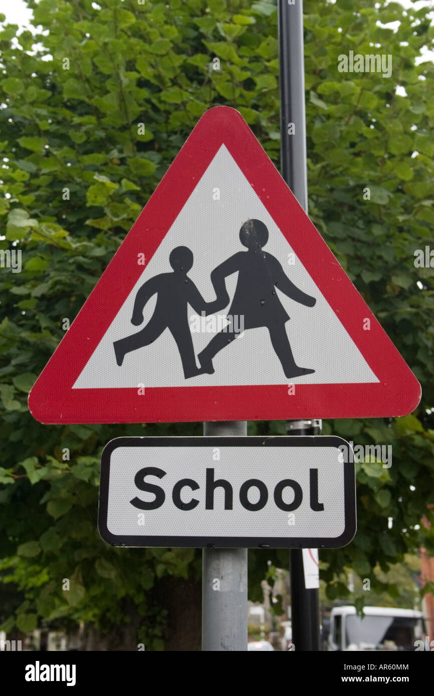 Caution school children road sign Stock Photo