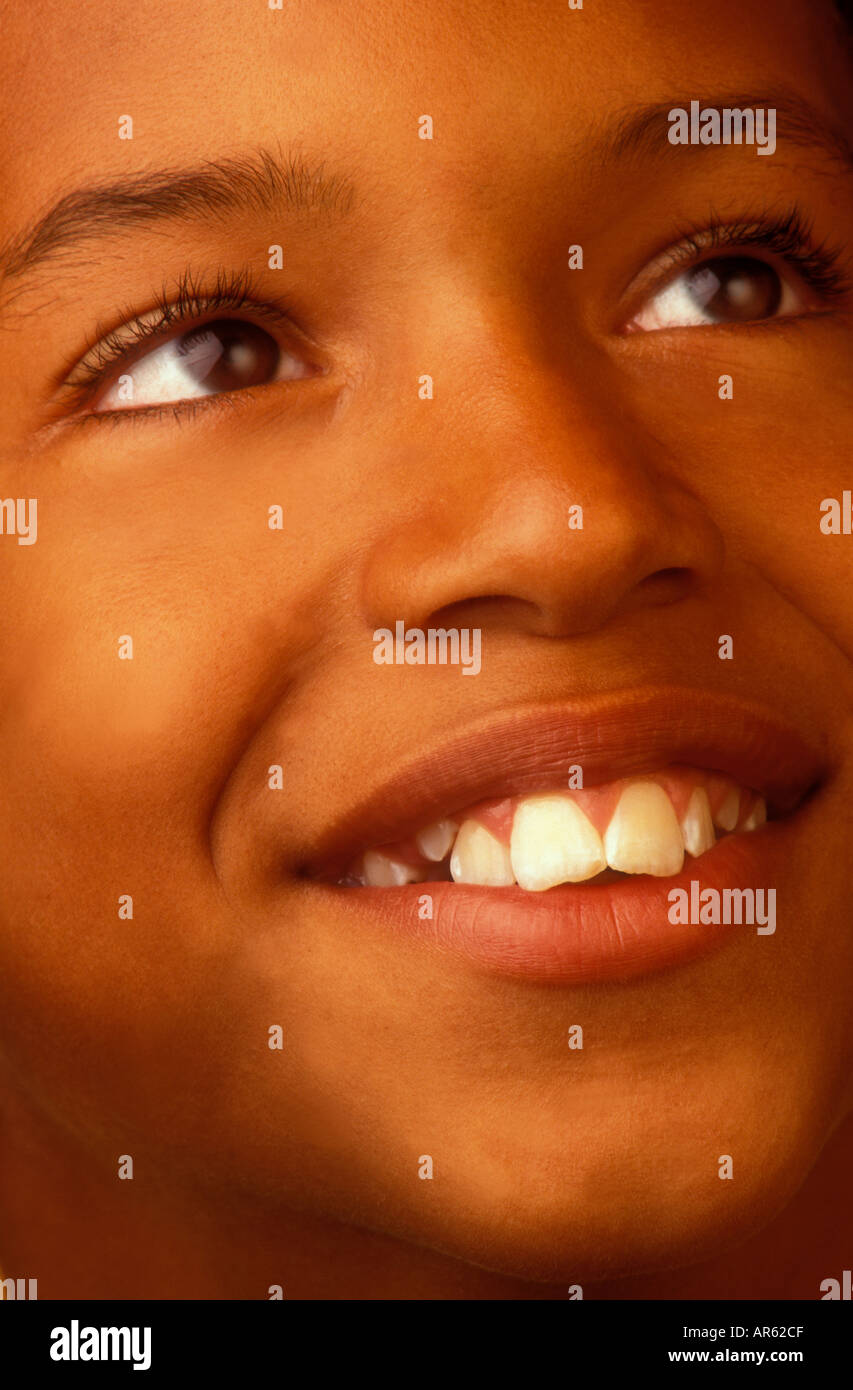 Teenage black boy smiling face hi-res stock photography and images - Alamy