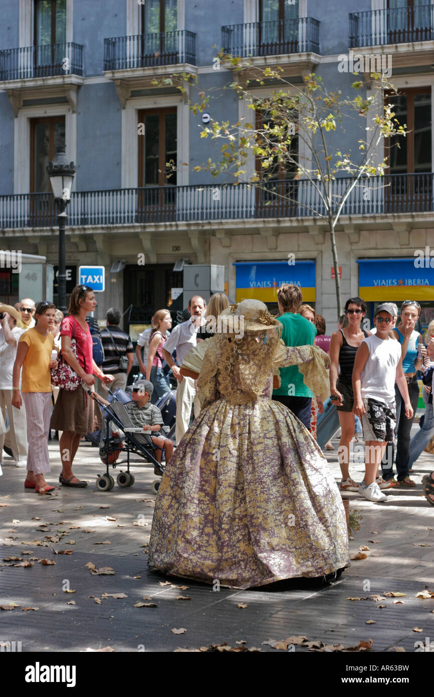 Public street performers in the tourist street 'the Ramblas' in Barcelona Stock Photo