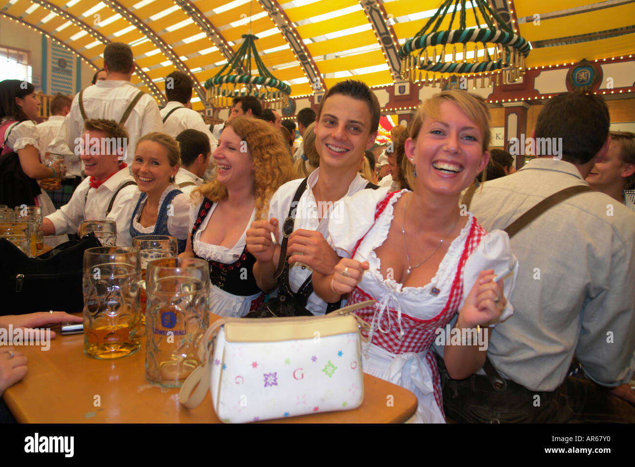 Europe Germany Beer Festival Oktoberfest dancing and drinking tent hall and partying Stock - Alamy