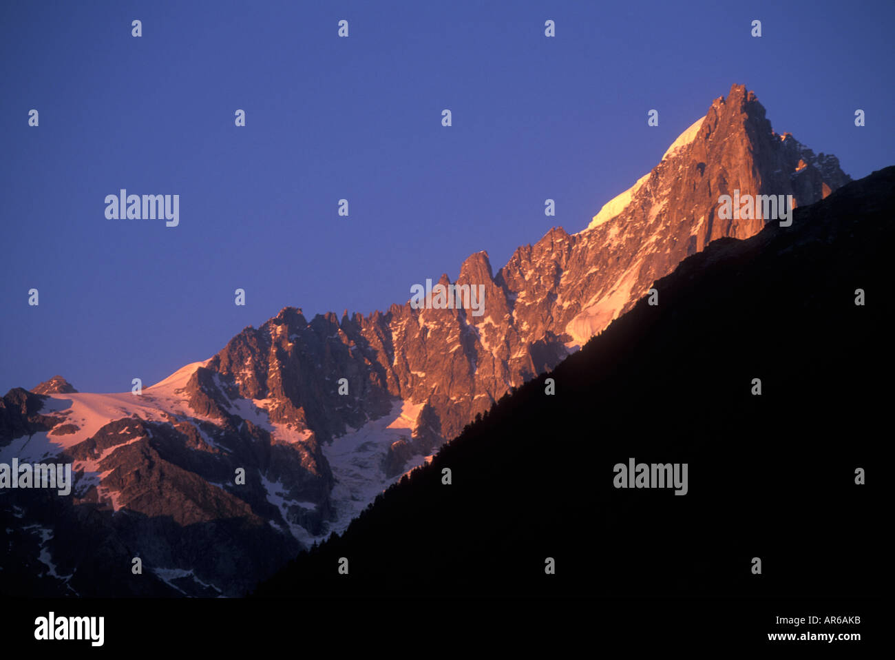 Alpenglow on Les Drus, Mont Blanc Massif, Chamonix, France Stock Photo