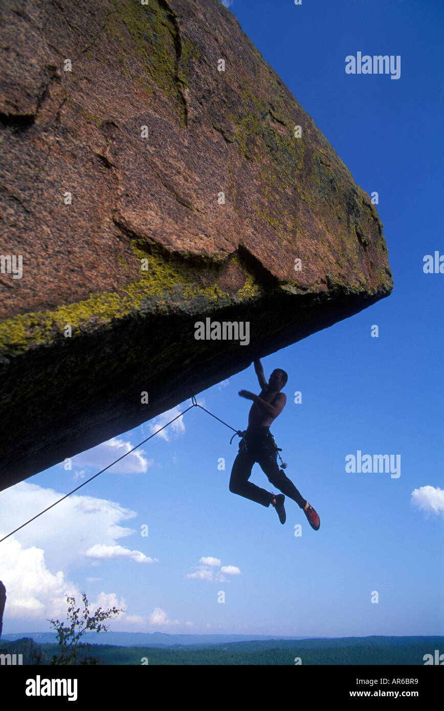 Rock climber on an overhang Stock Photo Alamy