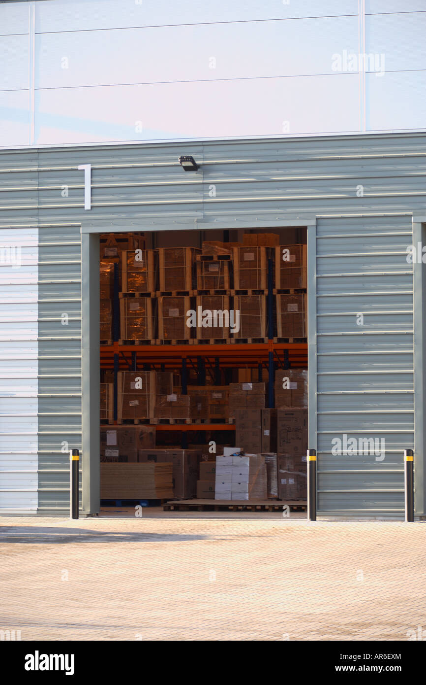 Closeup of a loading bay of a distribution warehouse showing stacked