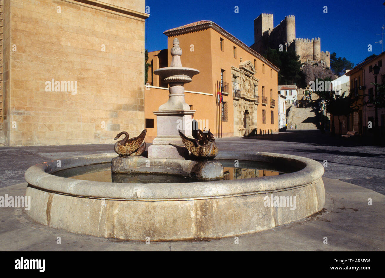 Fountain and the Condes de Cirat Palace Casa Grande and the medieval castle Almansa Castilla la Mancha Albacete Spain Stock Photo