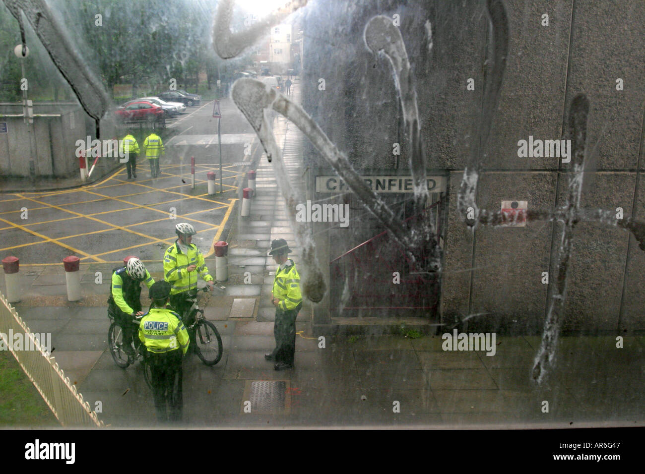 Police meet to patrol an anti-social behaviour exclusion zone on a housing estate London, UK. Stock Photo