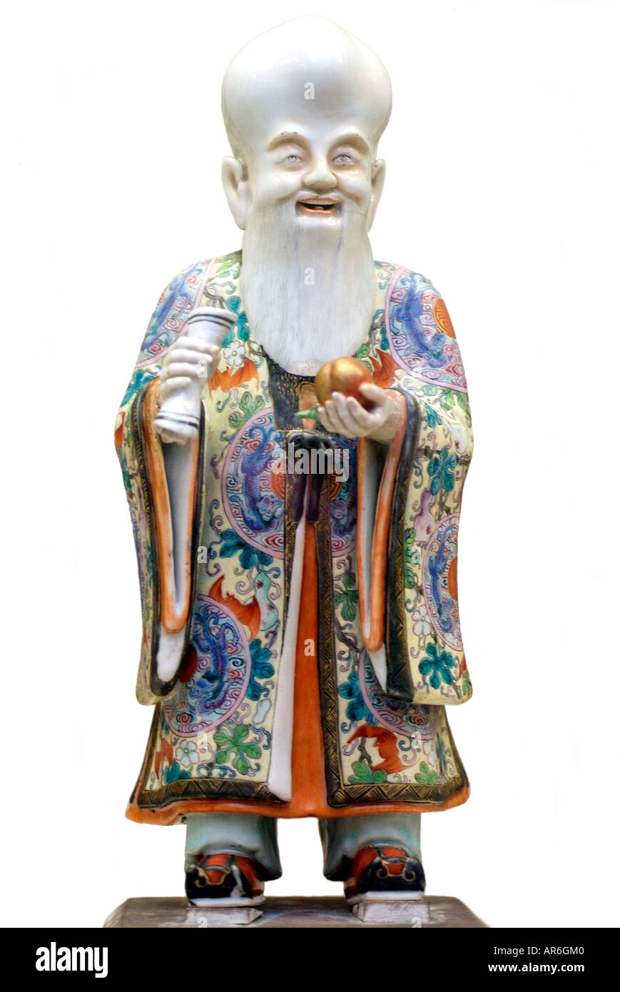 japanese porcelain japan figure antique ceramic  kimono wise man bald head rare decorative beard pearl wisdom Stock Photo