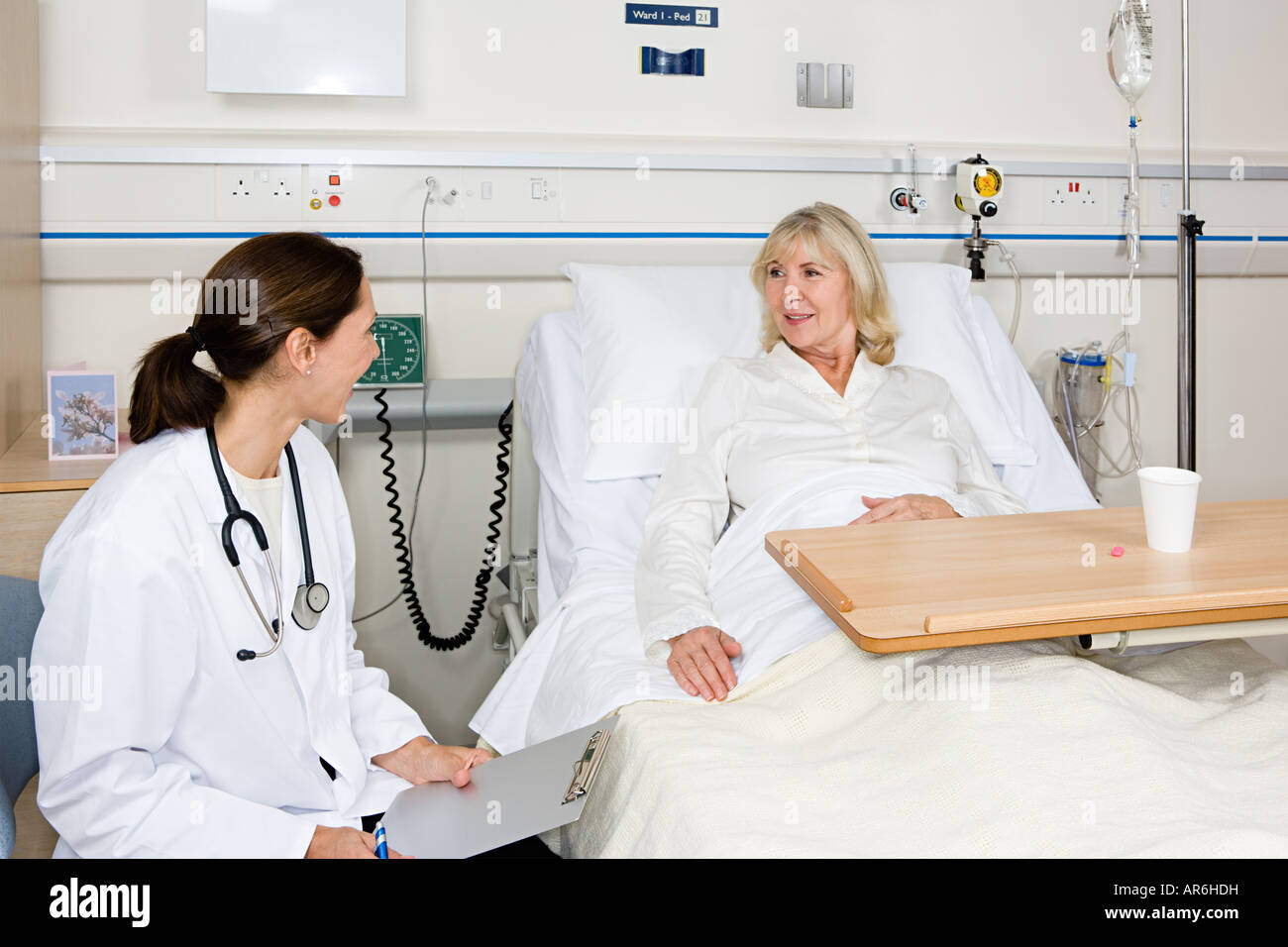 Doctor and patient in hospital Stock Photo