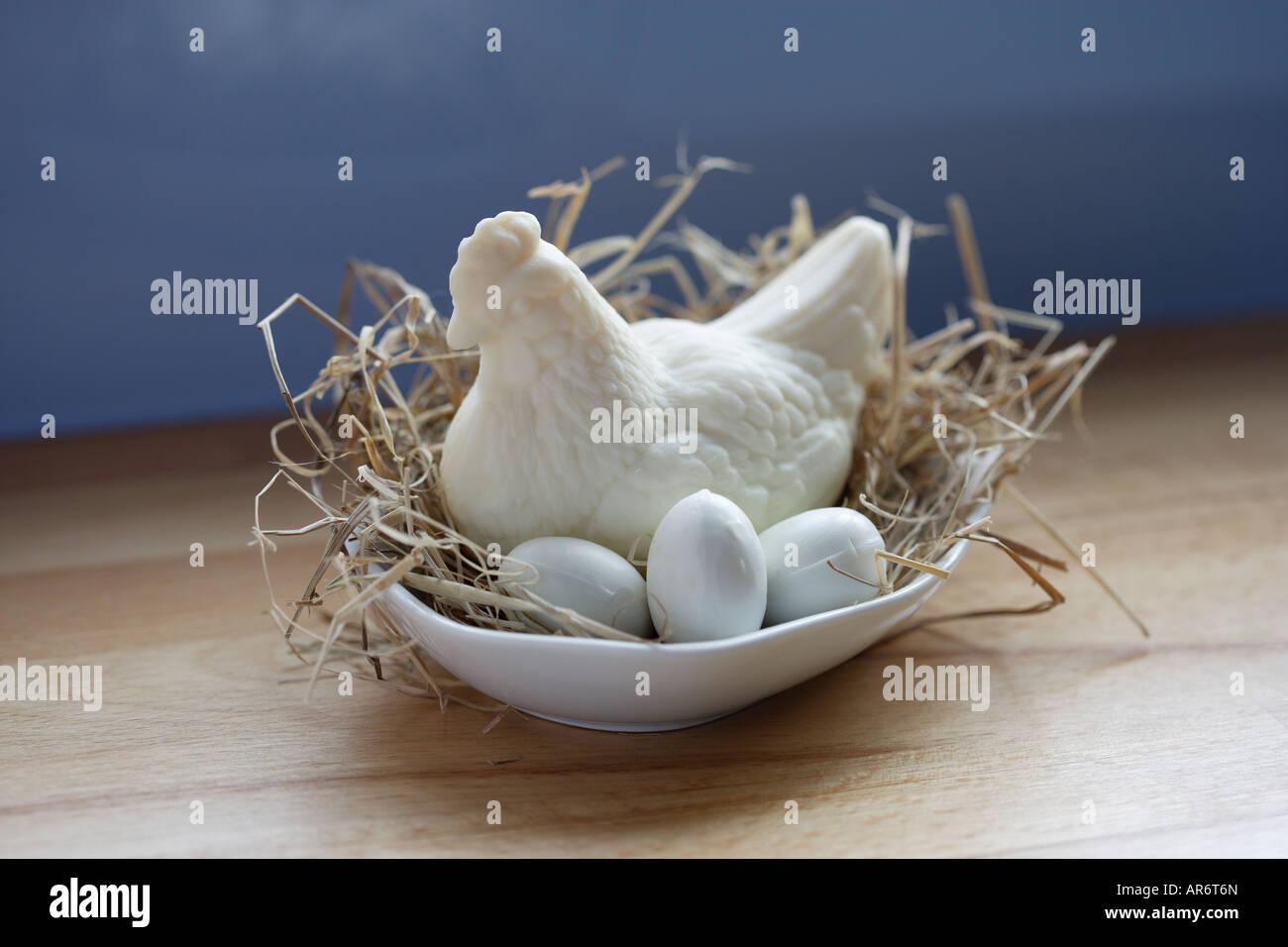 Chicken shaped soap and soap eggs in a dish Stock Photo Alamy