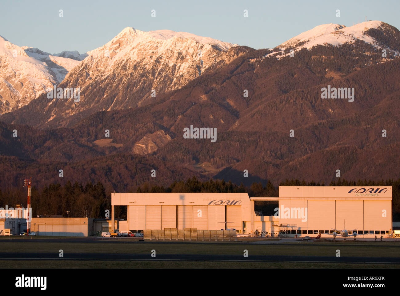 Adria aircraft hangers at Ljubljanas Joze Pucnik Airport in Brnik Slovenia Stock Photo