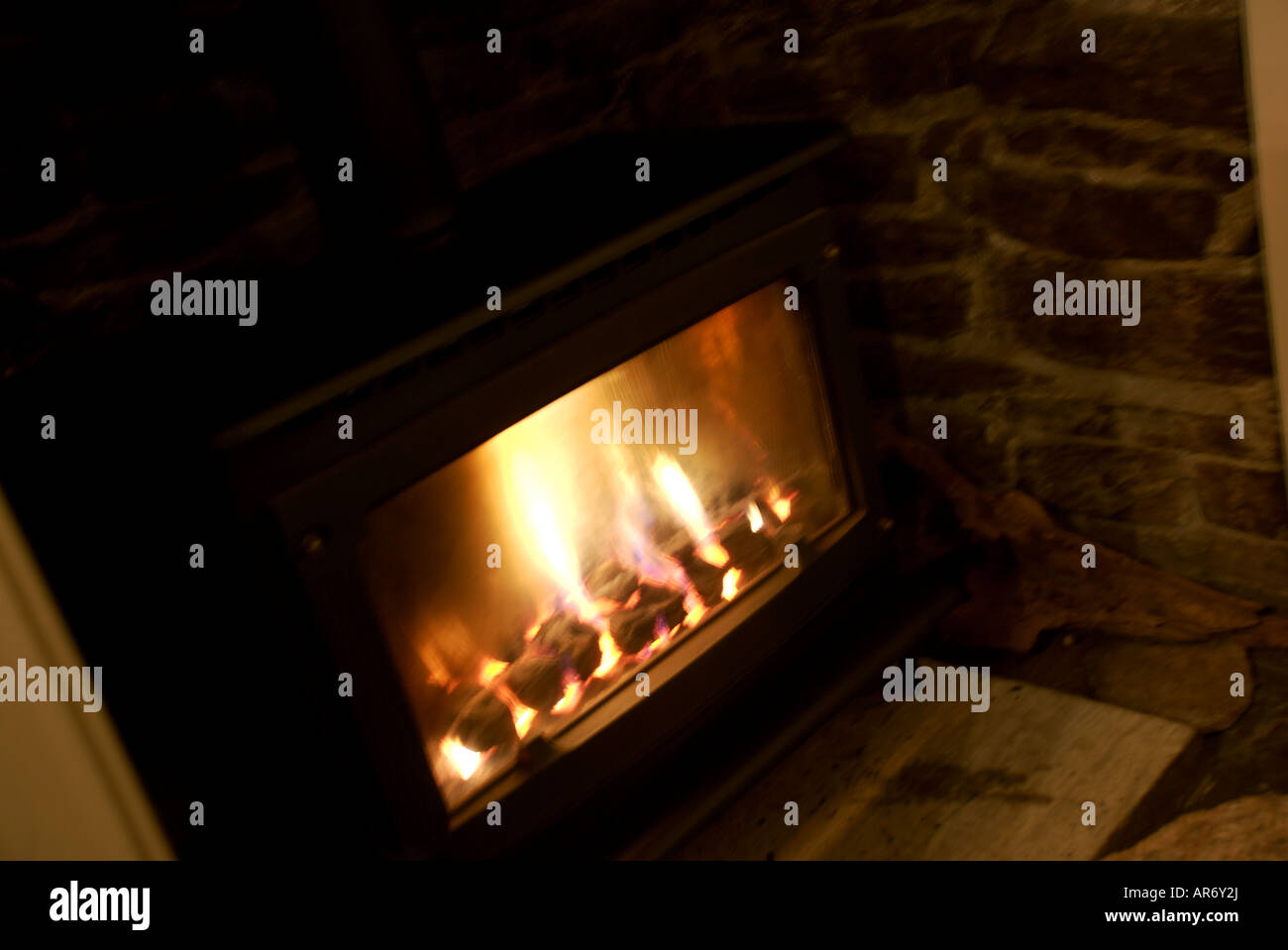 glowing-coal-fire-in-stone-surround-fireplace-stock-photo-alamy